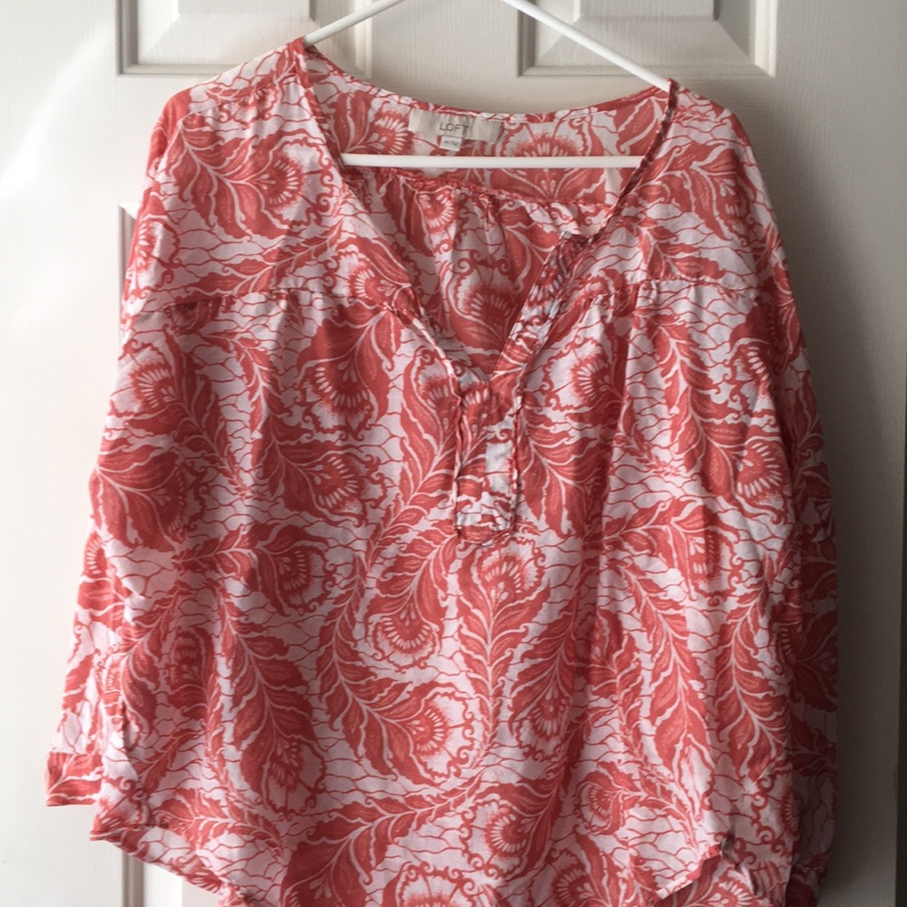 Reddish orange shirt